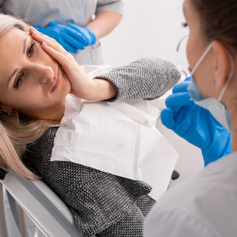 Woman with tooth pain