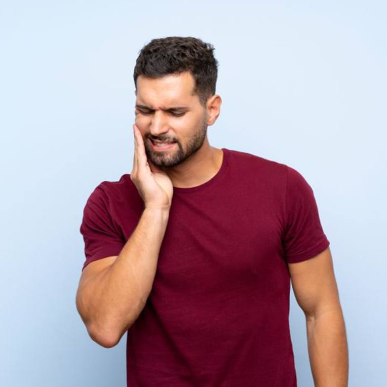 Man suffering from severe toothache