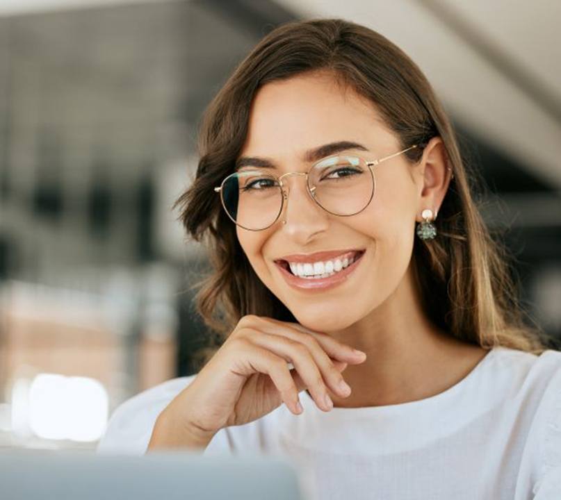 Smiling woman in an office setting